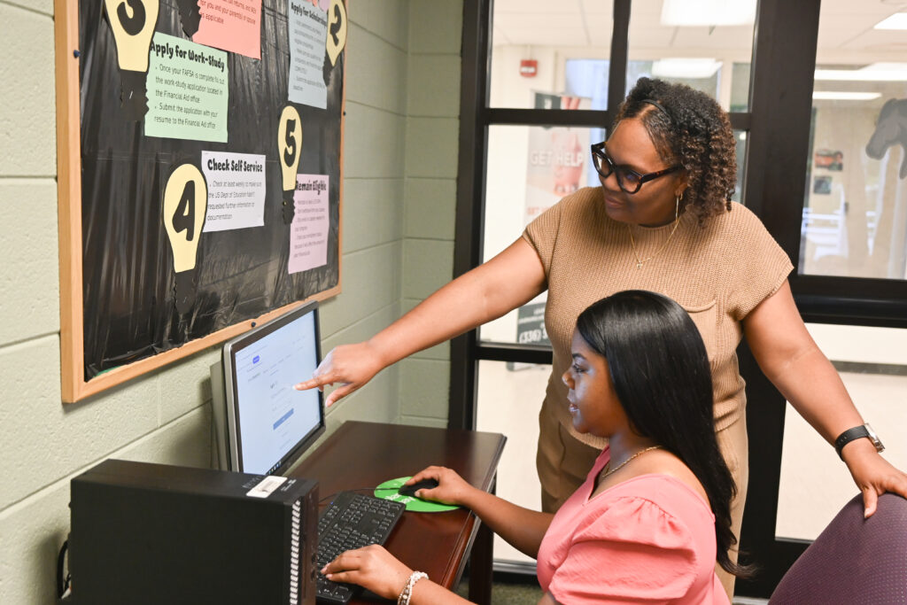 PCC student with advisor.